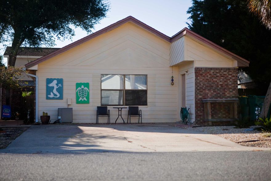 LOOKING FOR A GREAT UPDATED HOME IN THE HEART OF DESTIN FOR LESS THEN $200,000? THEN CALL NOW!As you enter your new home you'll love the vaulted ceilings, an open concept layout, a wood burning fireplace, and new laminate flooring. Make your way down the hall past an updated bathroom with new vanity. The spare bedroom has new carpet and a large closet. The spacious master bedroom is situated at the end of the hall, has a walk-in closet and an updated master bathroom. Head out back to a welcoming patio with a fully fenced back yard and plenty of room to entertain guests. Home comes with an American Home Shield - Shield Plus protection plan.This home is less than 2 miles from shops, entertainment, beaches, parks and boat ramp access.