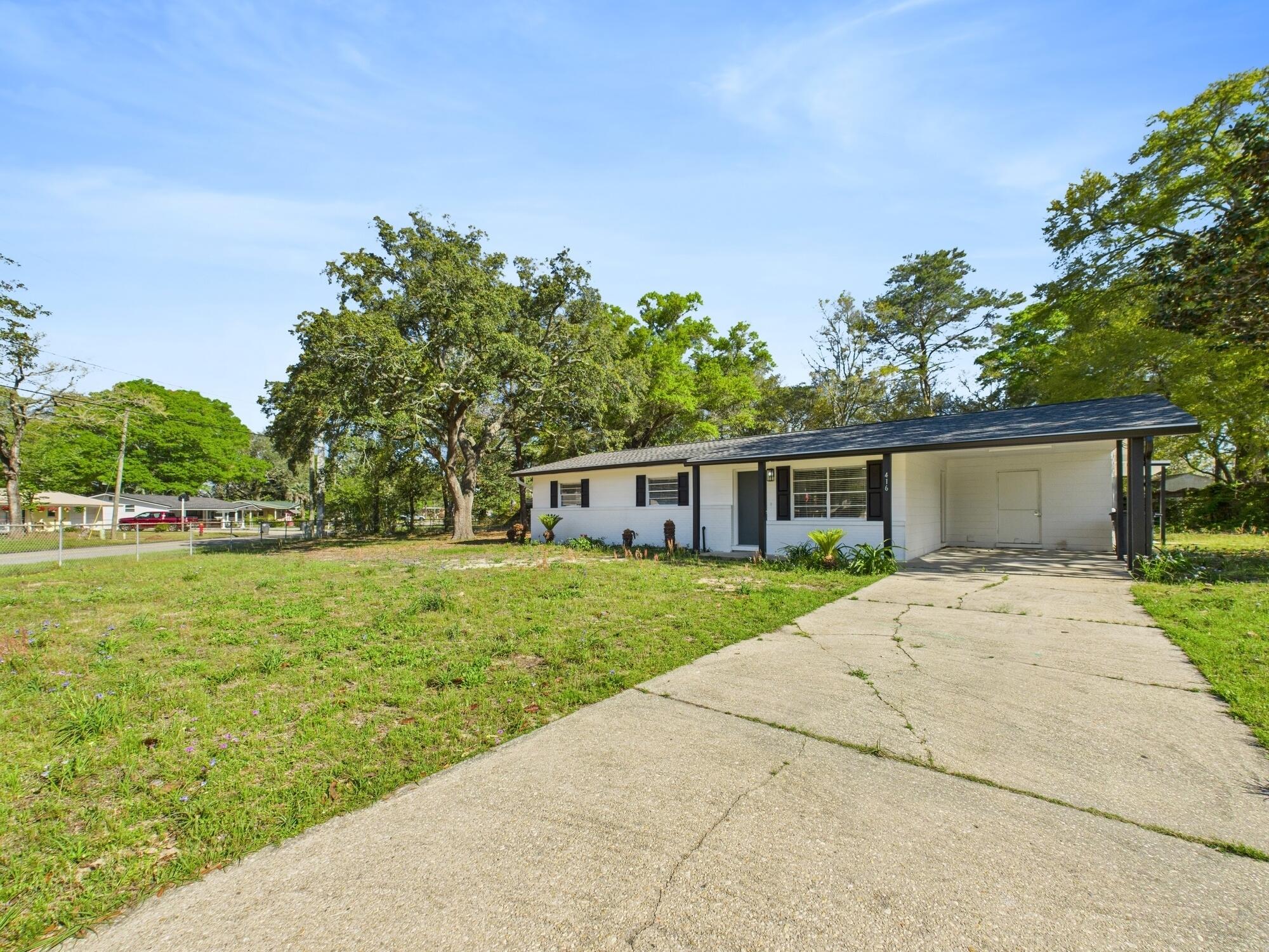 This stunning home has been meticulously remodeled this year from top to bottom, including all the major systems, blending modern elegance with classic charm. Situated on a spacious lot, this 3-bedroom, 2-bathroom home features a layout designed for comfortable living. The heart of the home is a stylish kitchen featuring sleek white cabinets, granite countertops, and a chic backsplash, all complemented by stainless steel appliances. Adjacent to the kitchen is a versatile living area, perfect for a cozy reading nook or home office. The open family room is ideal for gatherings andentertaining. Throughout the home, modern flooring enhances the contemporary feel, while the convenient mudroom keeps your home organized. The primary bedroom boasts an en-suite bathroom with a luxurious shower, and the additional bedrooms offer plenty of space for family or guests. Outside, enjoy the large yard, perfect for outdoor activities and relaxation. No HOA? Bring your boat and RV!! Don't miss the opportunity to make this beautifully renovated house your new home! Contact us today for a showing!