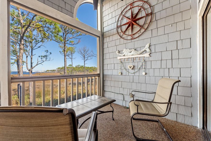 BEST VIEWS in Heron Walk of the Bay, Jolee Island Nature Preserve, and the boats of Baytowne Marina from this top-floor, extra large two-bedroom condo. Golf cart parking in place at the curb, offered  furnished and fully updated with coastal decor. Ready to rent as an investment property or would make a perfect second or primary residence . Features include updated kitchen with granite and stainless appliances, full size washer and dryer off kitchen, plank tile floors throughout, large walk-in closets in both bedrooms, outside storage closet, screened balcony with access from both living room and Master for bird and boat watching, updated bathrooms with granite vanities, assigned parking directly in front of the unit entrance. New A/C in 2018