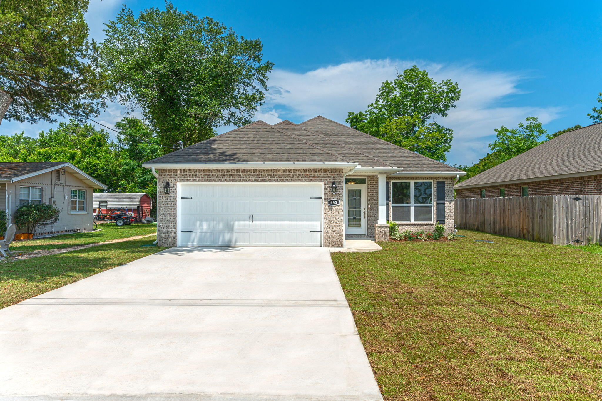 Seller is offering $5,000.00 in Buyer closing cost or rate buy-down assistance with preferred lender/title agent. Welcome home to this beautiful Brand New 4 bedroom 2 bath home centrally located minutes from the white sandy beaches, air force bases, shopping, and restaurants.  As you enter this beautiful home you will enjoy entertaining in the separate dining room off the kitchen.  The kitchen offers beautiful white cabinetry,  breakfast bar, granite countertops and tile backsplash.  All floors are plank tile flooring except the bedrooms have carpet.  The master bedroom offers tray ceilings with crown molding and a spacious walk- in closet.   Buyers to verify all areas of importance including, but not limited to room sizes, lot size, and  zoning. Make this brand new home yours today.