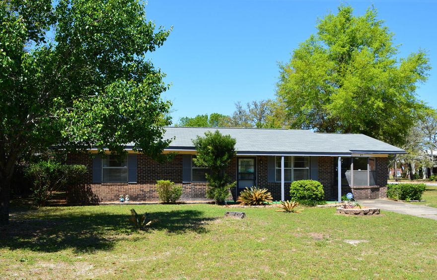 MOVE IN READY home in popular Port Dixie conveniently located just minutes from Eglin AFB's front gate, area schools, shopping, restaurants and of course the white sandy beaches. This 3 bedroom/2 bath block home with front brick veneer has been partially renovated to include new kitchen cabinets, new counter tops, new dishwasher, new bathroom cabinets, new flooring throughout the home and freshly painted on the inside. This well maintained home offers lots of space with a formal living room with built-in shelves, a formal dining room with a bay window, a kitchen with eat-in space, a den/family room with a sliding glass door leading out to an open patio and the laundry area conveniently located off the kitchen/formal dining area. Other property features; a corner lot, an