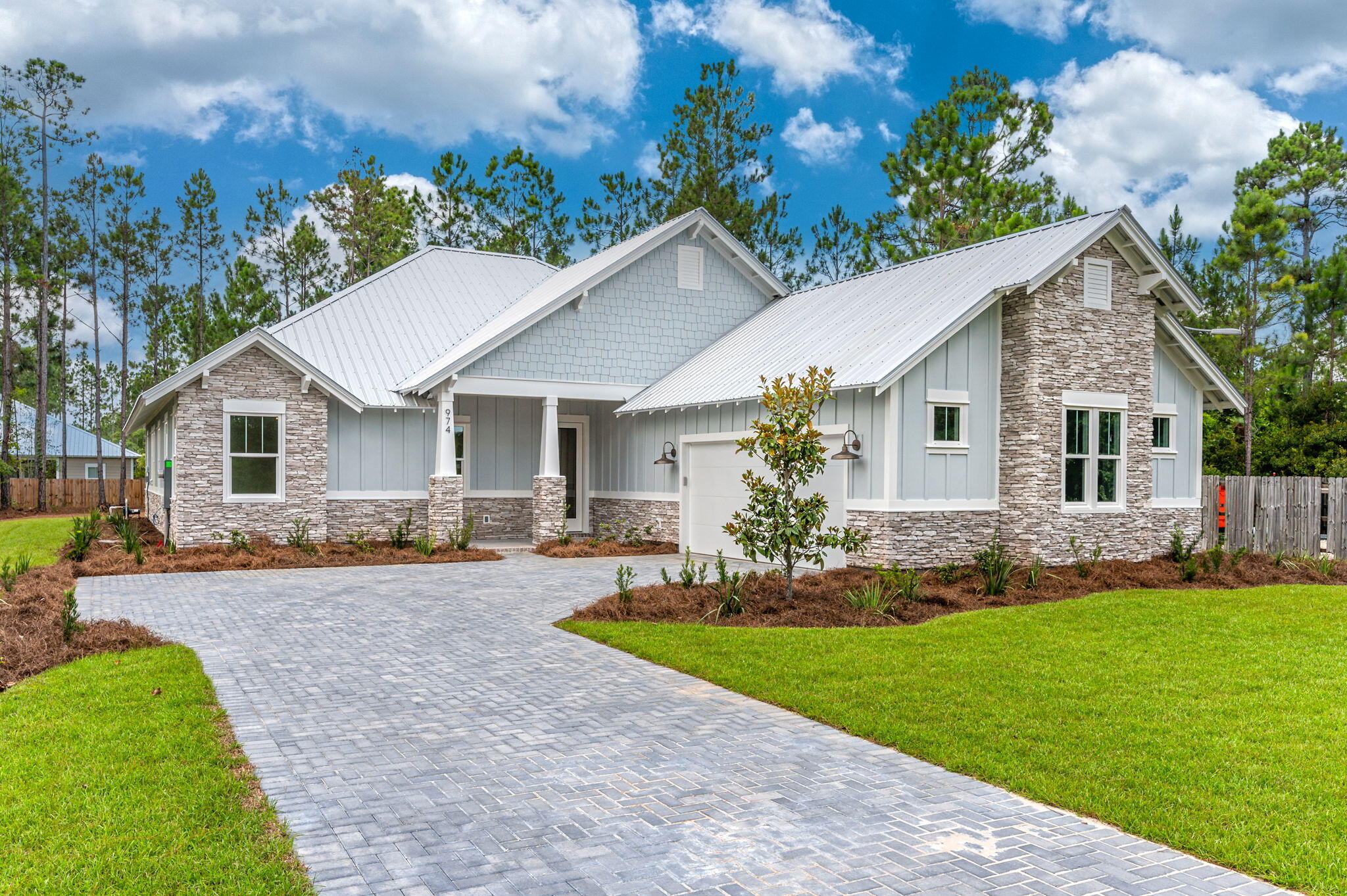 This 4 bedroom, 3 bathroom residence in Bear Creek Cottages is a must see! Designed by Mark Tanney, and built by ProBuilt Homes, this home has been meticulously crafted. An ideal floor plan creates a relaxed flow, while numerous windows and doors provide an abundance of natural light. A large living room opens to a spacious dining room and well appointed kitchen. The primary bedroom features a gorgeous ensuite bathroom and sizable walk-in close. Three additional bedrooms and two bathrooms round out the home's interior.