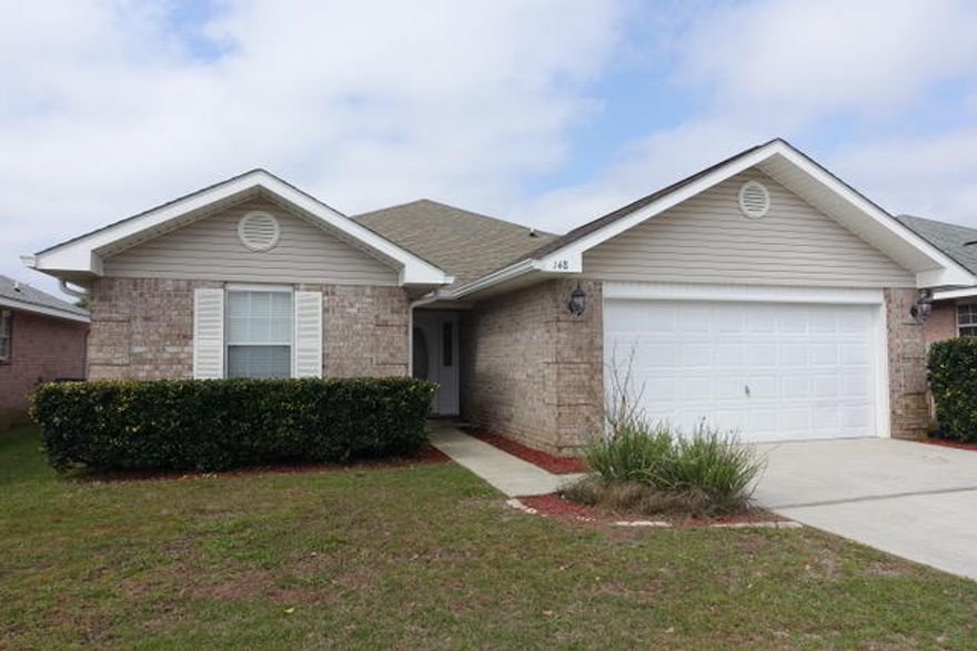 Beachside Community. 4 bedroom, 2 bath, home with open floor plan and tile floors throughout, featuring spacious living room/dining room, kitchen has white cabinets with granite countertops & breakfast bar. Master suite has walk in closet and full bath with double vanity, garden tub & linen closet. 3 Guest bedrooms share a guest bath. Laundry Room. Back patio and large fenced backyard. Paradise Retreat is a great community with North & South Entrance Gates, sidewalks, streetlights, and private beach access. Convenient location. School bus goes through Community. Low Maintenance Brick. Newly painted. Lawncare & Pest Control are Included in Rent. NONSmokers Only. (Pets: only 1 small dog)