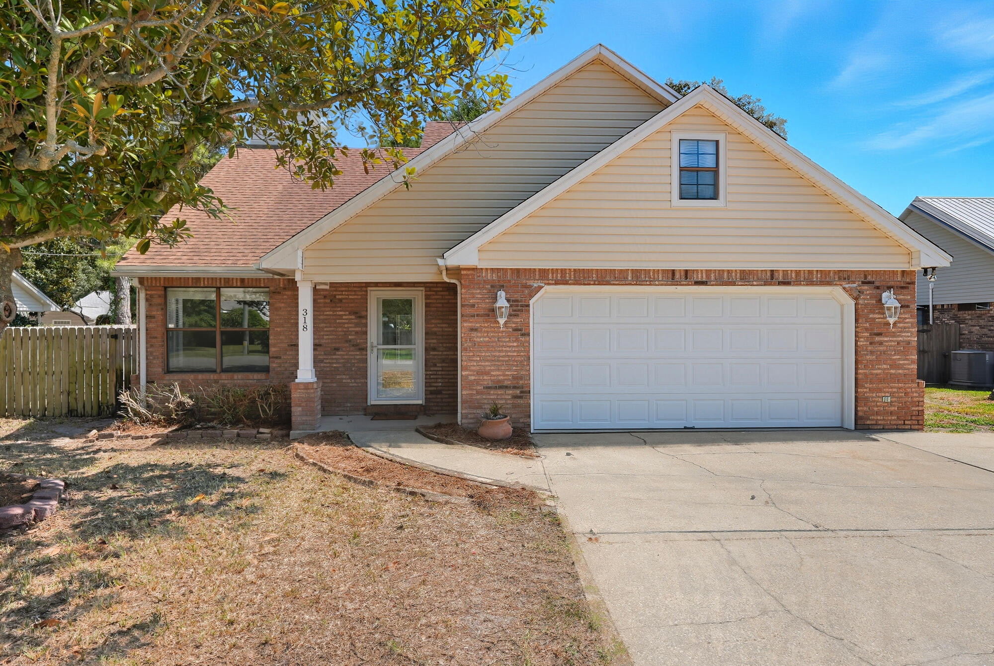 Cannonball into coastal living at 318 Sailfish Circle! This 3-bed, 2.5-bath Destin gem packs big personality with vaulted ceilings, a cozy fireplace, and a first-floor master for easy living. Out back is your own tropical playground -- a sparkling pool, fenced deck and patio for weekend BBQs, and plenty of room to park a boat or RV. Upstairs, two bedrooms share a Jack-and-Jill bath, perfect for family or guests. All of this tucked in West Destin, minutes from Crab Island, local eats, shopping, and the Gulf. Whether it's splashing, relaxing, or launching your next adventure, this home makes every day feel like vacation.**In the process of finding out if this 2.9% interest rate is assumable**