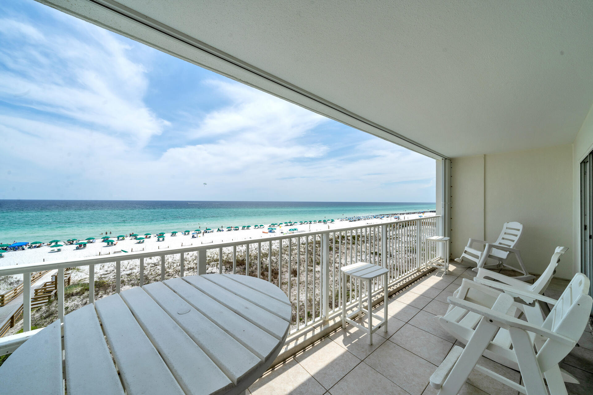 BACK ON MARKET NO FAULT OF SELLER! Incredible opportunity to own a fantastic Gulf of Mexico and beach front condo in Fort Walton Beach on Okaloosa Island!  Located in the Gulf Dunes complex, home to the ultimate luxury coastal lifestyle - you'll find this fabulous 2 bedroom + bonus room (bunkbeds) + large utility room condominium! Gorgeous panoramic view of the beachfront and Gulf of Mexico from this elevated 4th floor condo (effectively the 5th floor of the building) with directly accessible beach and new beach walkways! Spacious and well equipped, this condo offers a desirable floor plan which boasts a gulf front master suite and gulf front family room, both with balcony access! As a bonus, hurricane shutters are on the balcony.