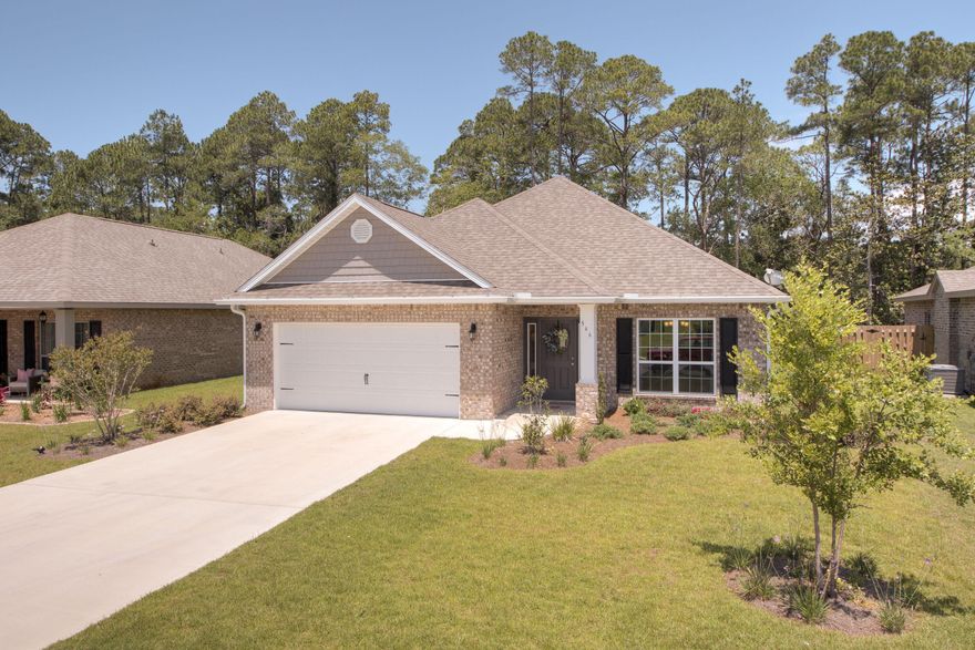 This model perfect/turn key home is a MUST SEE! This spacious open floor plan featuring 3 bedrooms, 2 baths, office/formal dining area and 2 car garage is located in the highly desirable neighborhood of Driftwood Estates. This home is situated on a large lot up against the trees creating a perfect blend of indoor and outdoor living. This highly upgraded home offers porcelain wood look tile floors in the main areas of the home, light granite countertops, elegant tray ceilings, stainless steel appliances, under cabinet led lighting and beautiful modern backsplash in the kitchen, 5ft tile shower in the master bathroom with bench seating. The back covered patio is screened in offering a great place to entertain or relax with nature.