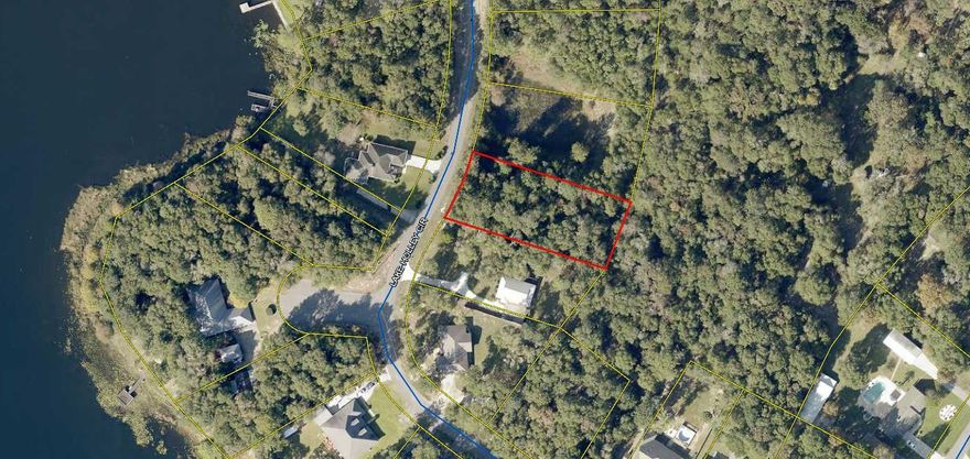 Beautiful building lot in exclusive subdivision! Wooded 1/2 acre lot on paved street. Exclusive subdivision with restrictions, no mobile homes allowed.