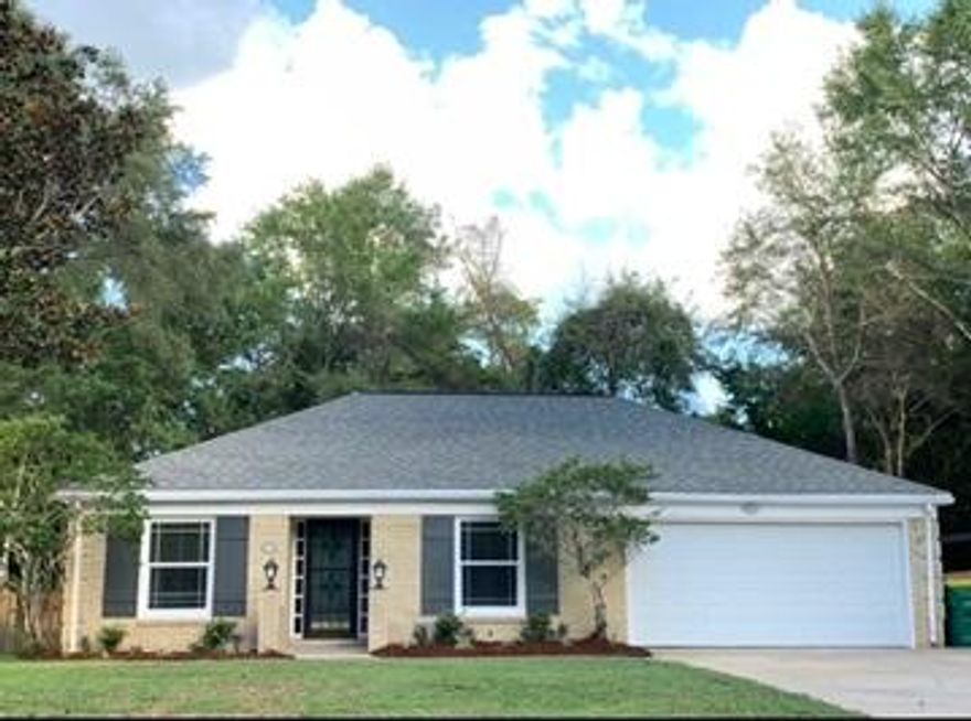 Completely renovated 4 bed, 2 bath home in highly sought after Niceville, Rocky Bayou area - close to military bases, shopping, award winning schools, bay and beaches (beaches of Destin and 30A are just over the bridge)! Quiet neighborhood with no HOA and boat ramp at end of street. Renovations include brand new kitchen with all new stainless steel appliances, shaker white cabinets and granite countertops. New luxury vinyl plank flooring throughout, new vanities in bathrooms, beautiful shiplap around fireplace, new paint and new baseboards, new copper wiring throughout home, and no popcorn on ceilings! Walk in closet in master bedroom, new ceiling fans, Eco friendly Nest thermostat and crown molding. Large dining room and large study with built in bookshelves that could be used as an office or playroom or converted into a 5th bedroom. Freshly painted garage with a work bench and pull down storage as well as a storage closet. This home has ample parking with a 2 car garage and long driveway, as well as space to the side of the home, perfect for that boat or motorhome! Not included in the square footage of the home is a 250 square foot florida room with new waterproof vinyl plank flooring, that is located at the back of the house and has a separate wall AC unit - perfect for entertaining as it opens up to your expansive wooden deck that oversees your large fenced in back yard. The privacy fence backs up to the protected greenway providing further privacy.  Storage shed in back