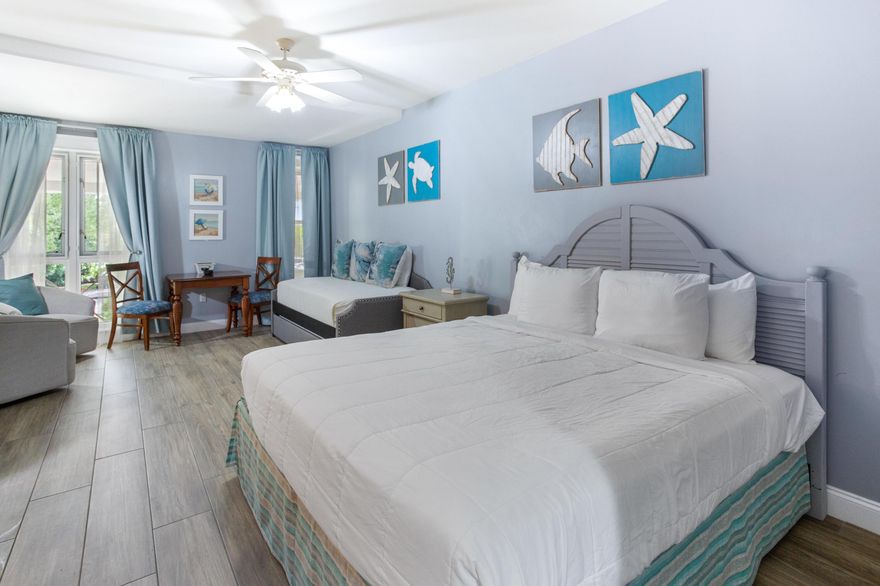 This fully furnished second floor condo located in the Grand Sandestin is updated with fresh coastal decor and furnishings and a new AC in 2022. Wood look tile flooring provides easy care and maintenance. In addition to the king size bed there is a trundle bed to accommodate extra guests. The kitchenette offers a mini fridge, microwave, toaster, and coffee pot. An interior closet and owner's storage cage allow plenty of room to store beach gear. Grand Sandestin owner's enjoy access to the resort style pool, kiddie pool, spa, and fitness room.