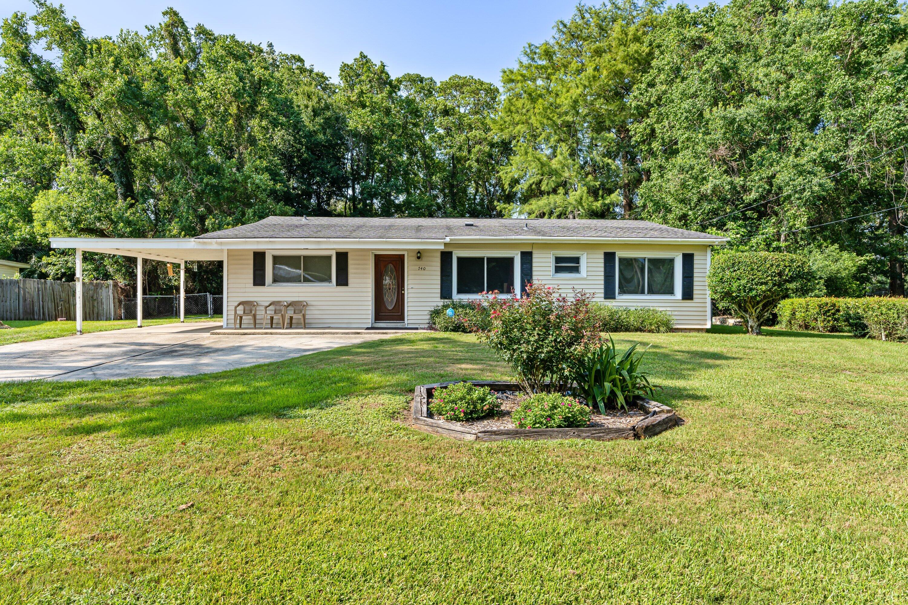Don't miss the chance to view this property and make it yours today. Whether you're looking for a comfortable family home or a peaceful retreat, this 5-bedroom, 2-bathroom home with its large porch and additional office area is sure to captivate your heart. The water heater was replaced just this year, the carport had the roof replaced in 2013, has had annual preventive termite treatments since 2014 with a transferrable termite bond.  Embrace the opportunity to enjoy the Florida lifestyle with a nice yard to hang out in, perfect for your loved ones and pets to play outdoors. There has been some foundation settling, for more details ask your agent for scope of work documents.