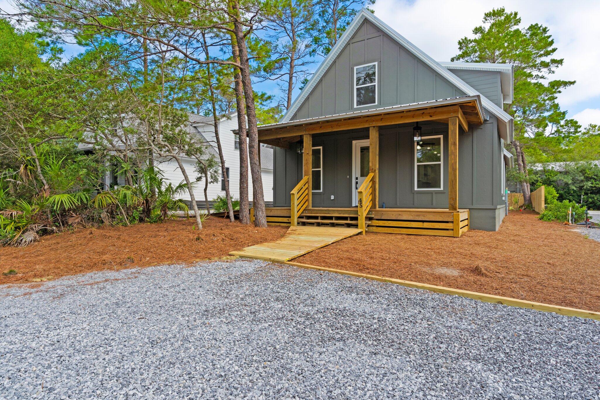 Newly built home in the heart of Point Washington. Primary suite and additional guest suite with full bath on first floor and three large bedrooms and bathroom upstairs. Covered front porch, rear grilling porch with natural landscape to enjoy the outdoors. Home is fully furnished. Small dogs allowed. Washer and Dryer Included