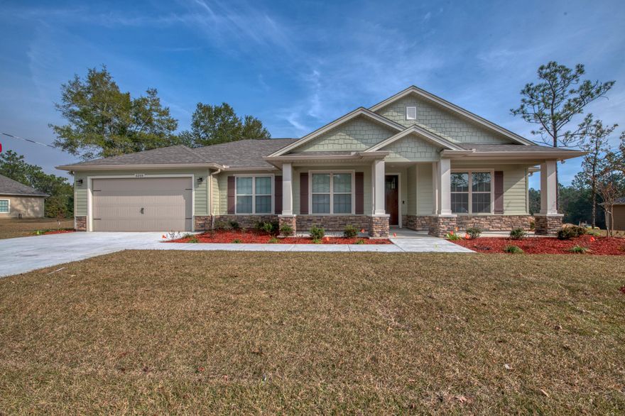 Estimated completion date Oct 30th. This craftsman style home is space efficient. Sit on the large front porch and sip a cup of coffee. Enjoy the open concept of the Kitchen, Dining and Family room with stone surround fireplace. Multiple access points to the lanai from the dining room and Family room. You will love the wood/tile combinations throughout the home. Utility room, half bath, Full baths with spa sinks. The Master suite includes spa sinks, a large walk-in closet, separate shower and garden tub. Decorative Columns, cedar shake siding and stone accent the exterior of the home. Actual colors may vary and are subject to change. Seller will pay $3000 of buyers closing costs with the use of a preferred lender. See more comments section for color selections.