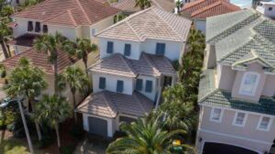 Welcome to the exclusive guard-gated community, Destiny by the Sea! This newly updated home is situated just a short walk from the beach with relaxing Gulf views from it's balconies. 

Up the stairs and into the main entry, you are welcomed into the beautifully decorated main living area. This open living, dining, and kitchen concepts flows onto the balcony which spans the width of the home. 

The first floor is home to the first two bedrooms, one which features built-in bunks and the second which leads onto the tranquil private pool patio. The Master bedroom is situated on the third floor with a full length porch and beautiful, newly renovated Master bathroom. There is an additional 4th bedroom off of the Master. Updates to the home include a freshly painted ext. and int., among others.