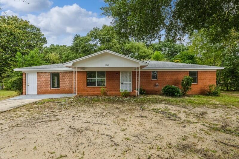 Don't let this one pass you by!So much potential with this three bedroom, two bath brick home! This home sits on a nice size fenced lot with a workshop and storage shed. Inside you will find fresh paint throughout and new carpet. Ample cabinet and counter space in the kitchen for all culinary needs. The carport was enclosed to make this home a three bedroom or use it as an extra living space.