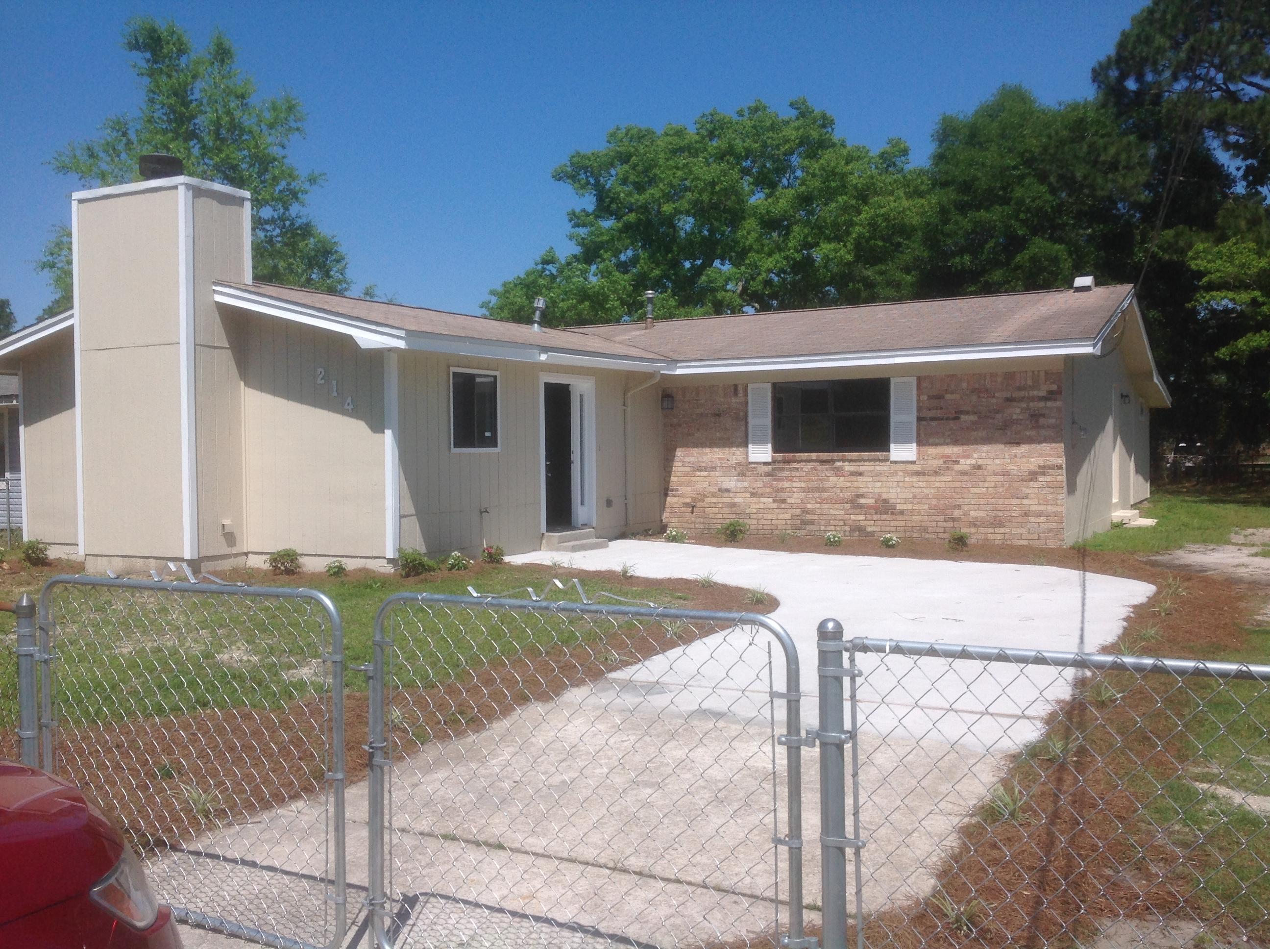 HUGE PRICE REDUCTION! NEWLY RENOVATED! Seller says bring offers!Right next door to the back ENTRANCE TO HURLBURT FIELD AIR FORCE BASE. A spacious L-shaped 4B 2.5BA home with cute curb appeal. Home has just had a COMPLETE makeover. When you drive up you will notice the brand new fencing and double gate that adds to the charm with a new extended cement driveway for extra parking. The exterior has had new wood siding installed and a complete paint job including the trim. Brand New Entrance doors both front and side off the kitchen. As you enter the tiled floored foyer notice the spacious formal living room with brick Fireplace and matching brick back wall which accents the room.