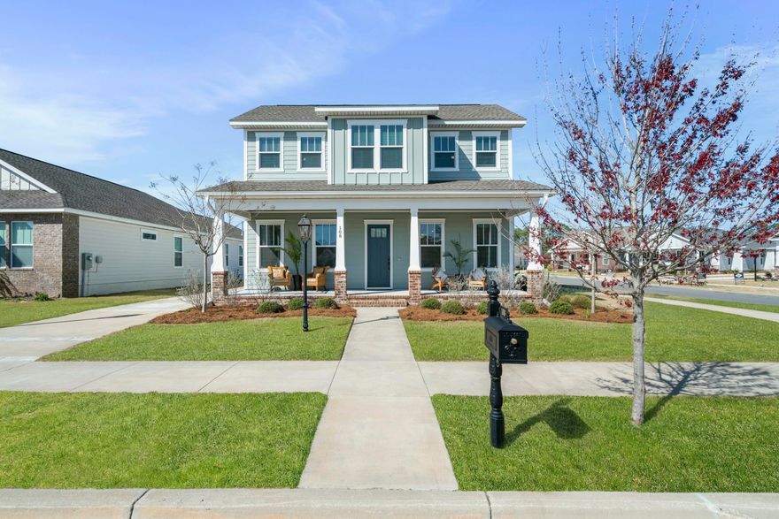 Located just blocks from the beach, this exceptional 4-bedroom, 2.5-bath, two-story home seamlessly combines modern design with relaxed coastal living. Situated in the amenity-rich Tapestry Park community, homeowners enjoy access to two resort-style pools, lighted sidewalks, expansive green spaces, a playground with slides and swings, tennis courts, a basketball court, and a clubhouse featuring a full kitchen, ideal for private events and celebrations. Upon entry, the home welcomes you with a bright, open-concept living space highlighted by striking exposed wood beams that add warmth and architectural character. The spacious living area flows effortlessly into the gourmet kitchen, creating an ideal setting for entertaining. The kitchen is thoughtfully designed with a gas range, vented hood, and microwave integrated into a large quartz island, offering both style and functionality. A generous walk-in pantry with custom shelving provides ample storage.

The first-floor primary suite is a true retreat, featuring a charming barn door for added character and privacy. The spa-inspired primary bath showcases elegant gold fixtures, quartz countertops, and an oversized walk-in tiled shower, along with a spacious dual "his and hers" closet layout. The laundry room is conveniently located on the main floor near the primary suite. Additionally, a functional mudroom just off the rear-entry garage and covered porch offers the perfect space for coats and shoes.

Upstairs, you'll find three generously sized bedrooms, each offering flexibility for family, guests, or a home office. A well-appointed full bath serves the upper level and features modern finishes with quartz countertops. Throughout the home, recessed lighting and cottage-style trim and casing add a clean, contemporary aesthetic.

No detail has been overlooked. The owners have added a professionally installed whole-home dehumidifier (see attached upgrade list for full details), along with smart light switches and a smart thermostat for convenient remote control. The garage is equipped with Magic Stairs for easy attic access and additional storage, operated by a remote. Exterior upgrades include newly installed pavers, a premium leaf-guard gutter system, and a screened-in porch, perfect for relaxing and enjoying morning coffee.

This thoughtfully designed home offers an exceptional blend of coastal charm, modern convenience, and refined elegance. Don't miss this incredible opportunity, schedule your private showing today.