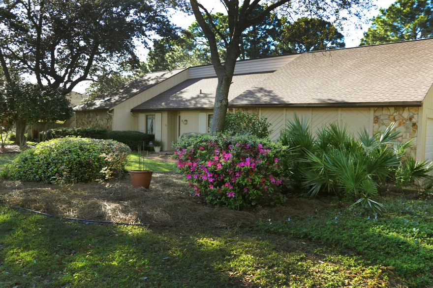 Home In Indian Bayou on a large shaded lot with a private pool, backing up to private wooded area. Owners have installed a new roof, sky lights,new pool liner, and oven 2016. New pool pump 2017. New ac 2014. Open kitchen plan with corian counter tops a large island and separate dining nook. Large bonus or Florida room heated and cooled overlooking the back yard and pool. Pool is heated by solar panels. Screened outdoor room with outdoor cabinets, sink and mini fridge. Separate office or mud room, in addition to the 3 large bedrooms. Large living area with windows overlooking back yard, with wood ceiling accents, and valuted ceiling. This home is cozy and cute. Fruit trees and flowering trees in abundance. Long driveway with side entry garage.