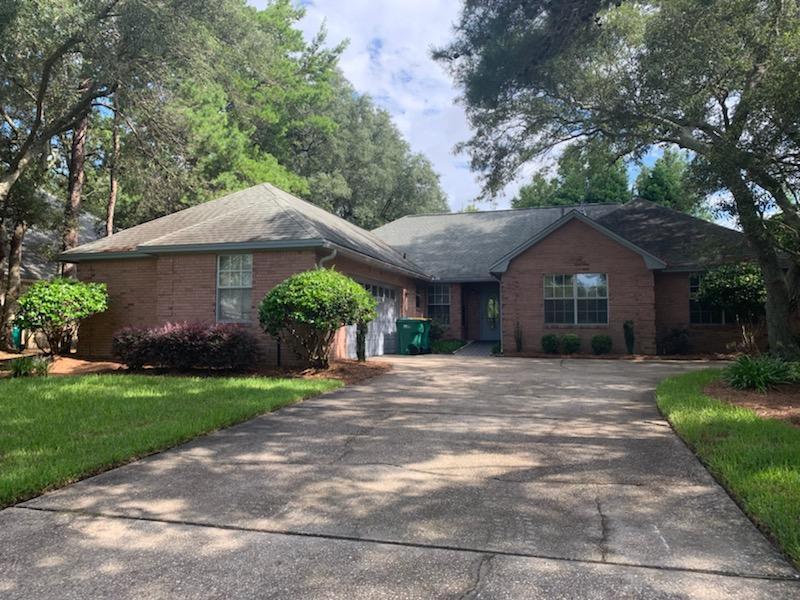 Perfect location!  Live the Florida dream,  This brick home boasts a large floor plan and pool! - Residential