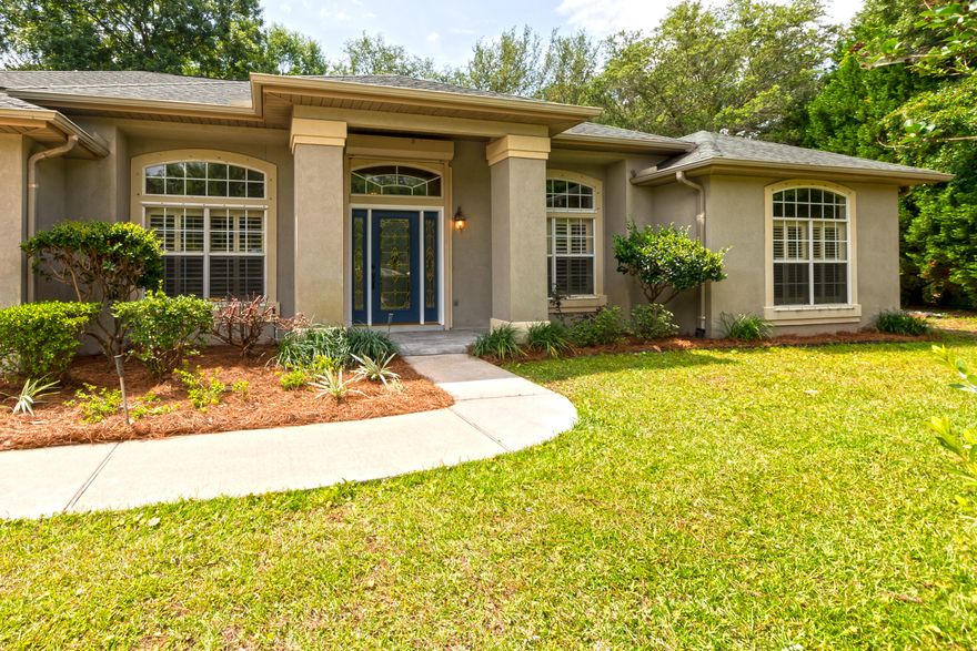 This amazing 4 bedroom 3 bath home is located on a cul-de-sac street, is walking distance to the Marina and Schooners (restaurant on the water) and has just been recently remodeled (2017)! This homes remodel included fresh interior paint, ''wood look'' tile through out all living areas, new carpet in the bedrooms, new Kenmore Elite kitchen appliances, new light fixtures, a new kitchen back splash, new master bath fixtures and accent tile...etc. It is an amazing home for entertaining with an open floor plan, large dining room and even larger screened in porch area. The back yard is lovely with overgrown trees and plenty of space to have children play or have a back yard BBQ. There is also a separate open office space or bonus area. Located in Bluewater Bay with great school zones.