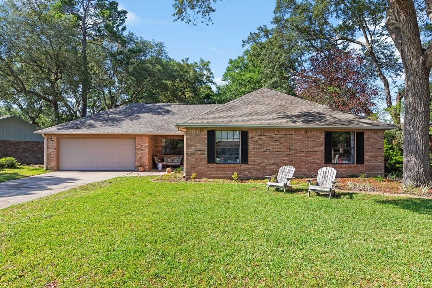 Experience the charm of this freshly roofed home in Niceville, free from HOA restrictions. The property boasts a spacious master suite equipped with a full bath and walk-in closet, complemented by three additional bedrooms. Both full bathrooms have been meticulously renovated to modern standards.The inviting family room, complete with a cathedral ceiling and wood-burning fireplace, is ideal for entertaining guests. The well-appointed kitchen seamlessly connects to both the formal dining and living rooms, offering a cohesive and open living space.Step outside to a generously sized, fenced backyard that provides exceptional privacy and space for outdoor activities.Conveniently located just minutes from shopping centers and a short drive from the beautiful Gulf beaches. This home is also situated within the sought-after Niceville school district.