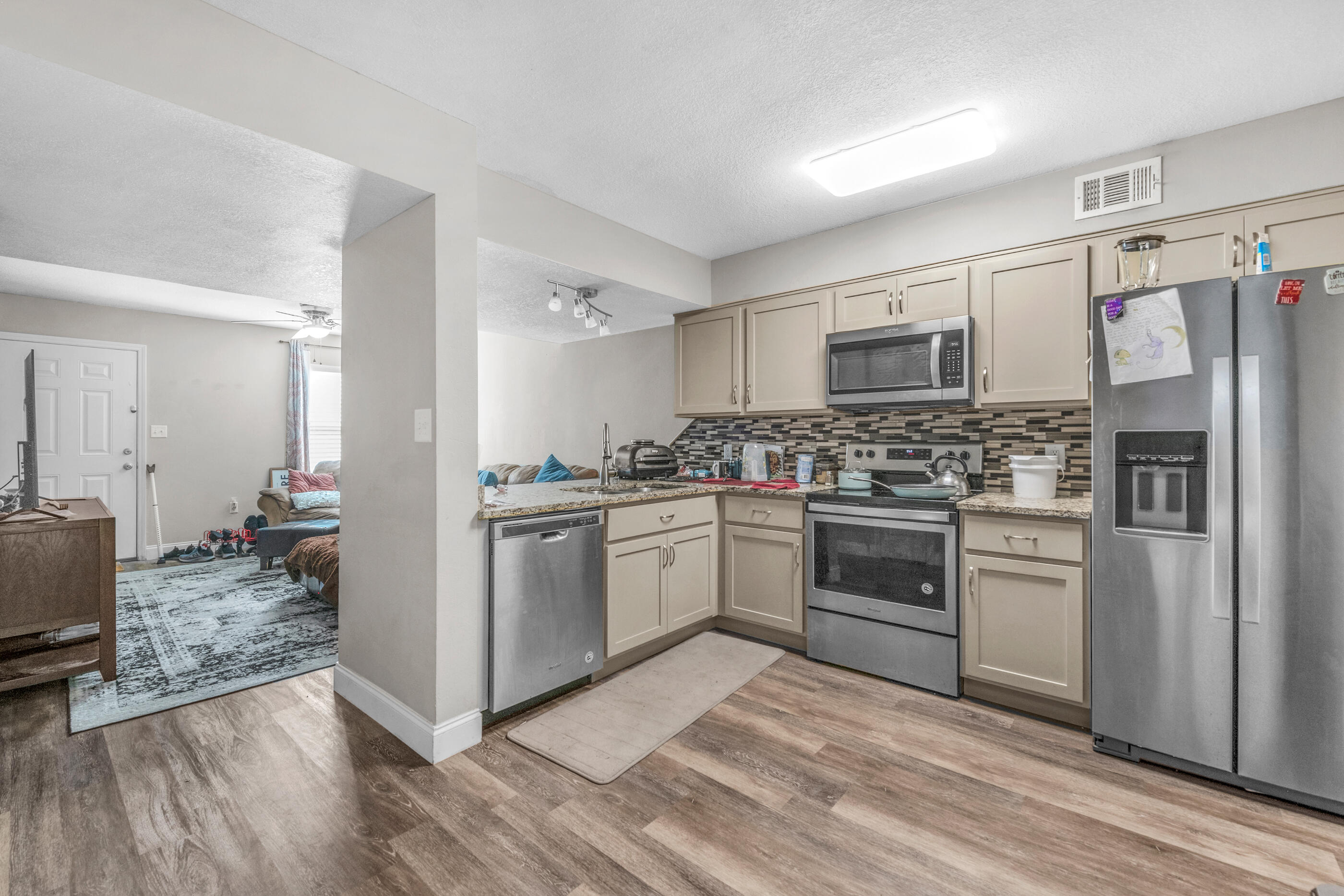Totally renovated, 2 bedroom 2 bathroom townhome unit conveniently located in the heart of Fort Walton Beach! This price point is unheard of in recent markets, nonetheless boasting a full granite suite throughout. This townhome unit has it all with private garage parking, fenced yard for furry friends, 2 year old cabinetry and fixtures, hardwood floors as well as many other highly improved living spaces. Both bedrooms are located on the second level, leaving you with much enjoyed open concept living areas in the first floor. There may not be a better value on the market today, with future rentability demand very high, commutes quite short, and would make a great fit for the first time home owner looking for low maintenance and affordability. Schedule your private showing today.