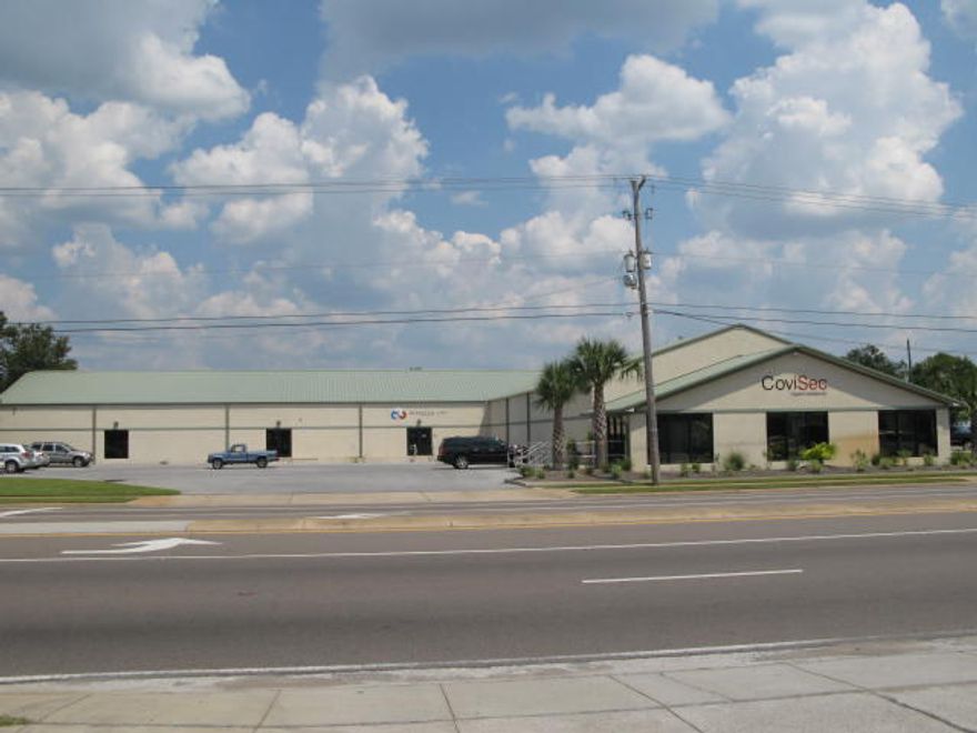 Building has showroom, offices, and warehouse space with loading dock. Building completely remodeled in 2008. Located 1 lot from stop light intersection, corner location with Entire building heated/cooled except about 6,000 sqft of warehouse. High ceilings in warehouse.