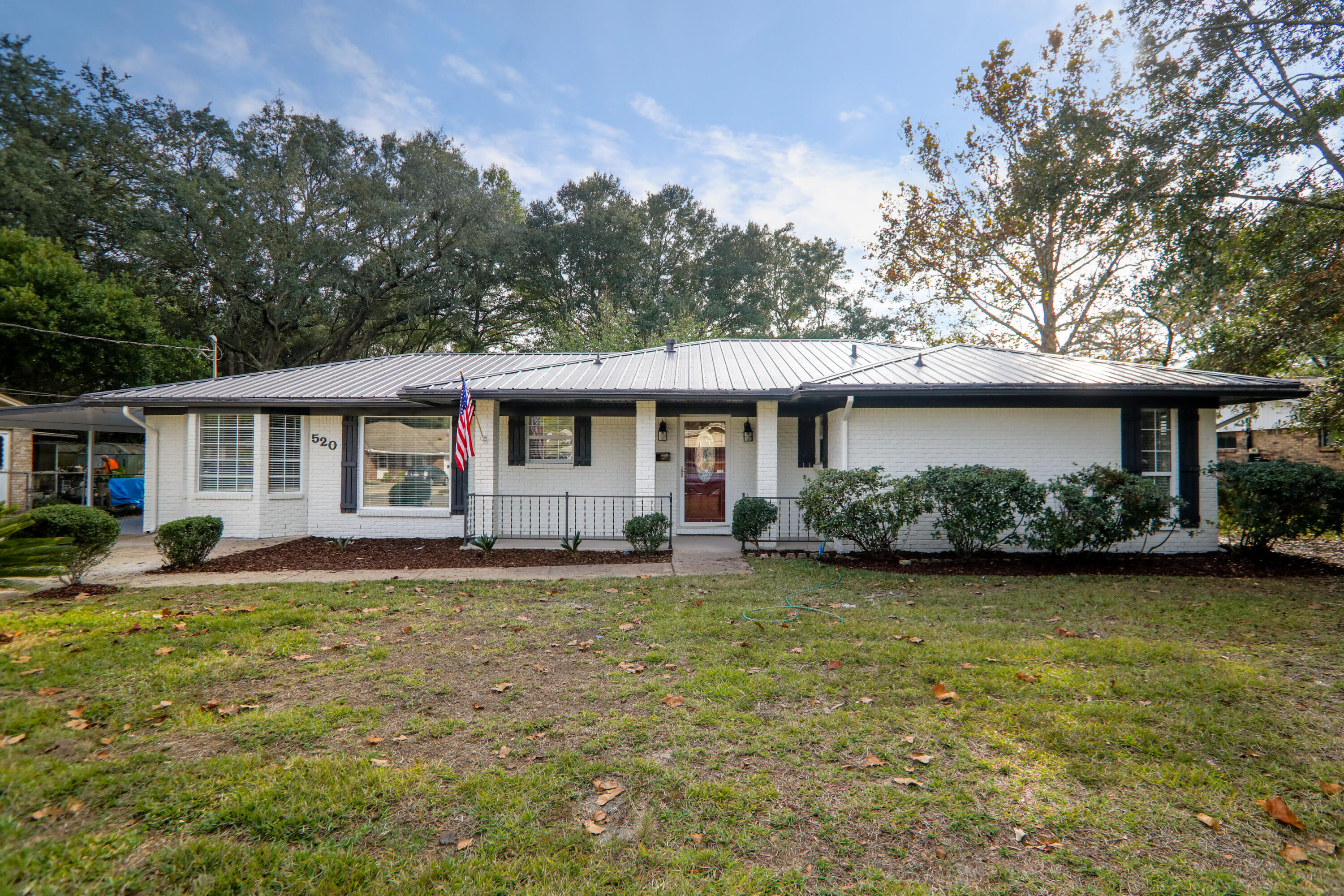 Location! Location!! Copper Wiring!! 2005 Metal Roof Revamped with new screws and freshly painted! ! 2017 Hot Water Heater, CHA, Great condition, one owner. Mini Spilt AC & Heat unit adding Square feet to family room. Total 1952 SF. Updated Kitchen with New Stainless Steel Appliances, New lights and flooring. Updated Baths with new Vanities, lights, mirror & flooring. New Paint in and out. New Lights/Fans throughout. New Laminate flooring in main areas and luxury vinyl in bathrooms and Carpet in Bedrooms. Lot's of details Nice shed in back .Kitchen Pantry Doors on Order,