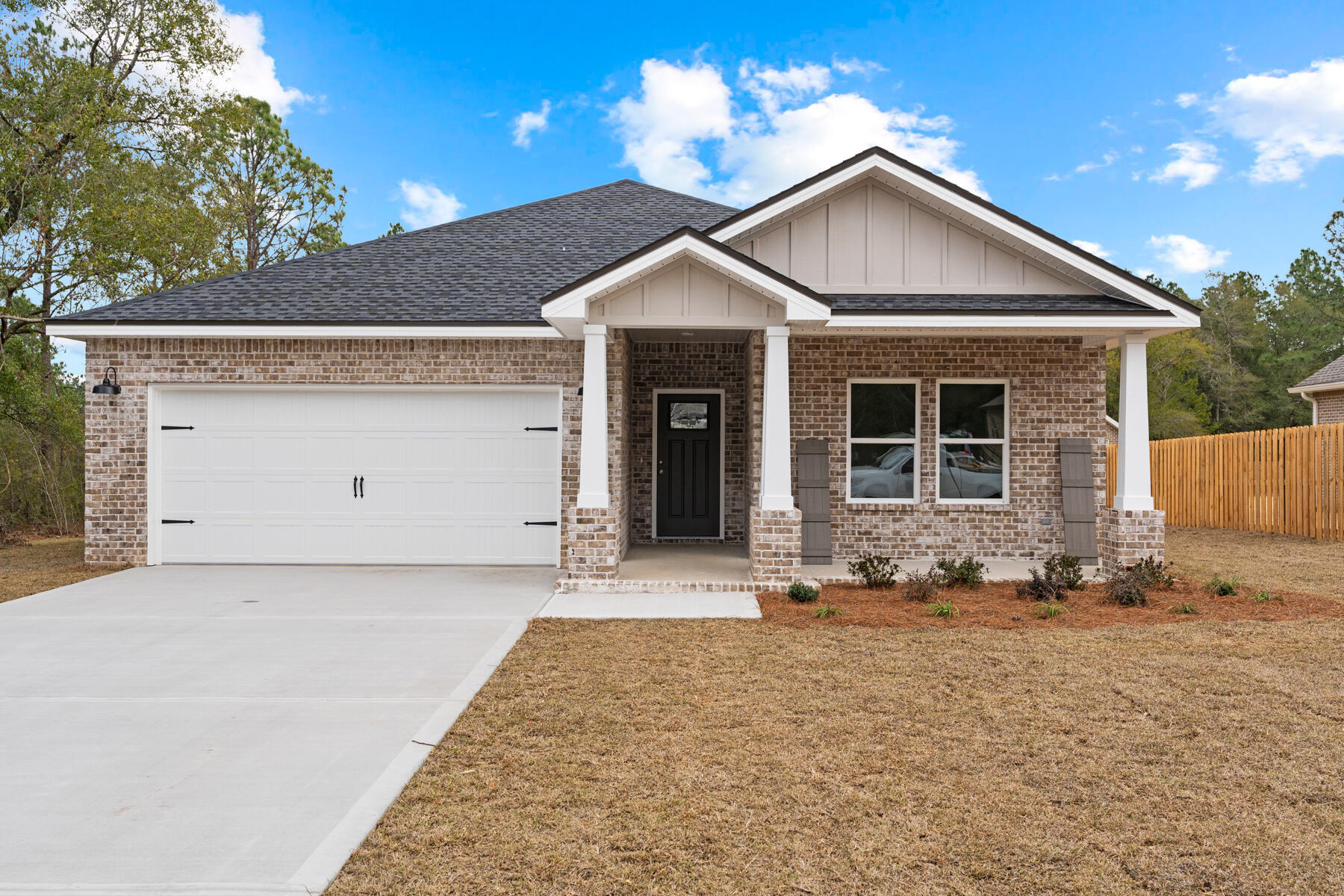 JUST UNDER 1400 SF AND SITTING ON HALF ACRE - This new home will be ready by the end of December; seller will contribute up to $10,000 towards closing costs and/or prepaids and/or rate buy down (restrictions apply).  Covered front & rear porches for relaxing, inviting foyer opens to family room which overlooks the kitchen/dining area.  Plenty of dining options from the bar seating at the work island to the dining space which opens to covered rear porch.  Kitchen has stainless steel appliances, white shaker cabinets, corner pantry and quartz or granite countertops.  Luxury Vinyl Plank in all common areas, carpet in bedrooms, recessed lighting and ceiling fans throughout.  Split bedroom design with the owner's bath having walk-in closet, double vanities and shower. Extra Parking Pad +Garage