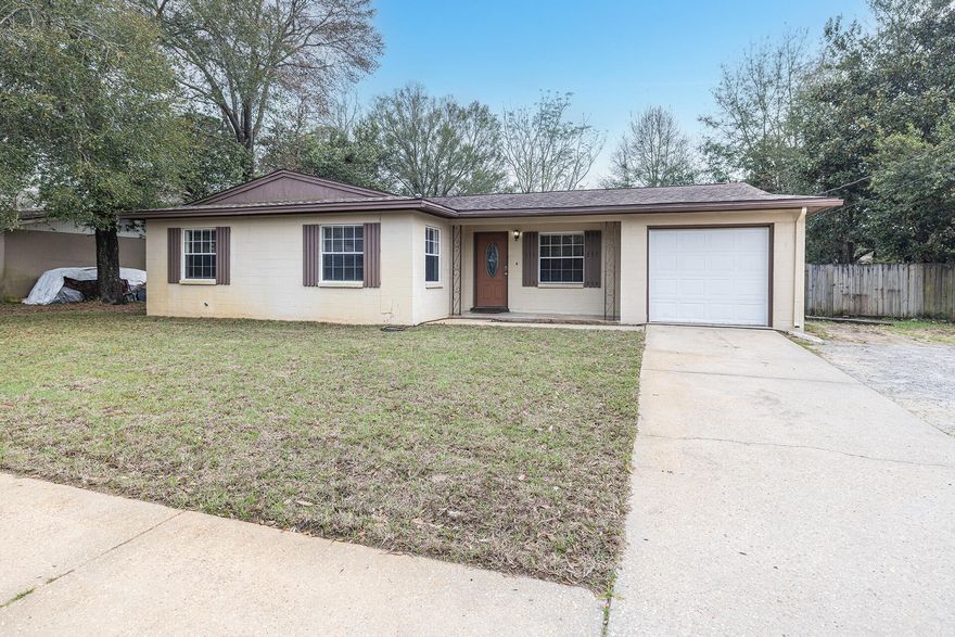 Newly renovated home, close to beaches and shopping.  This 3 bedroom 1 and a half bath home features new flooring and new paint throughout.  Large  Kitchen with beautiful dark cherry cabinets with Newer laminate countertops and a upgraded gas stove.
Fully fenced back yard.