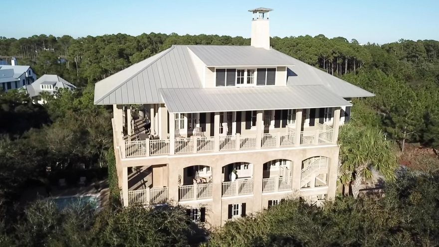 Newly Remodeled and Updated, this Luxurious 5 BR home is designed for Coastal Living and combines numerous ''extras'' with breathtaking Gulf and Lake views all within a 2-minute walk to arguably the most beautiful stretch of private beach anywhere on the Gulf Coast. Over 8,500 sq ft under roof: 4,518 heated/cooled, 2,212 wrap-around covered porches and 2,028 garage, it features a separately cooled wine room with wet bar, heated pool with spill-over hot-tub, 3 on-demand water-heater zones, elevator, 2 built-in offices, 2 home theaters, security/surveillance systems and whole-house stereo. All of this in The Retreat, one of the most prestigious beachfront communities on Florida's Emerald Coast, offering privacy, seclusion and natural beauty unmatched by any other. For More info click here: