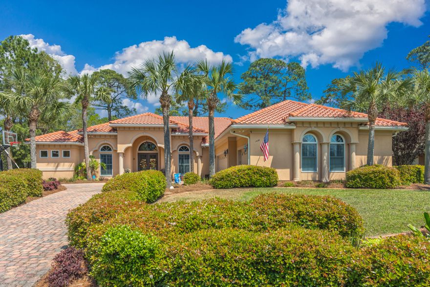 Custom home built by Gary Miller Homes, a premier homebuilder, in the cul-de-sac of Glenlake subdivision of Bluewater Bay, one of the most desirable subdivisions in Okaloosa County. Sitting on a relatively flat (FEMA Flood Zone X) 0.42-acre lot on the Bluewater Bay Lake Course, this home has a concrete barrel tile roof, a paver driveway, numerous amenities, automated features, and lots of extras. The total size is 5249sf including a 3-car oversized garage with industrial shelving, work bench, slat wall and epoxy flooring. It has 3768sf of conditioned space with 4 bedrooms with large walk-in closets in MBR and BR2 plus 3 bathrooms with linen closets. The master bathroom has a custom tiled doorless shower with a ceiling-mounted radiant heater with timer. There are two 3-ton Trane XR17 variable motor HVAC units with natural gas heat including mobile phone-controlled thermostats that were installed new in 2019. The oversized 48-gallon Rheem Professional natural gas hot water heater was also installed new in 2019 and has a hot water loop pump for instant hot water at all sinks, tubs, and showers within the home. The home also has a fireplace in the den with natural gas logs. The professionally landscaped yard with 22 mature palm trees is watered by an irrigation system with automated electronic control and eight zones including soaker hose, industrial spray heads, and palm tree bubblers. The entire perimeter of the property is captured by an underground electronic Invisible dog fence.  All landscape beds are curbed with Procrete decorative custom concrete landscape borders. The home was built to exceed hurricane codes, and its exterior is made of high-quality stucco with several custom architectural features, such as decorative stucco columns and dentil molding. The built-in, heated, and lighted gunite pool and spa is surrounded by a stucco enclosure with high-density screening.  The lanai can be enjoyed from the kitchen area through frameless architectural glass.  The lanai, with two ceiling fans, can be accessed via four 8ft tall high-quality Andersen sliding doors to access a large natural gas-feed cooking grill. The interior has large 20-inch tile laid diagonally and newly installed luxury vinyl plank throughout.  All counter tops in kitchen, bathrooms, and living room alcove are granite. The interior has several arched doorways and 10-14 ft high, multi-level tray ceilings with accent (rope) lighting.  Also, there is custom toe-kick lighting in the kitchen, living room and all bathrooms. Most windows are covered with high-quality wood plantation shutters painted to match trim-work.  The sliding doors are covered with ADO Wrap retractable vertical blinds.  There is a full-home sound system with controls in the kitchen, living room, den, master bathroom, garage, and lanai. The home has numerous automation features. The garage doors and laundry room door lock can be controlled via your mobile phone and a Ring doorbell is installed near the front door.  Most rooms in the house have hard-wired ethernet connections for maximum internet bandwidth.  The house has a combo hardwired/wireless alarm system with four keypads, multiple LED exterior flood lights around the house, and four HD surveillance cameras to monitor 24/7 the front yard, driveway, interior laundry entrance, and lanai/pool area.  The surveillance cameras, several key interior lights with dimmers, and the Ring doorbell video can be accessed and controlled from a mobile phone. The home also has monitored smoke detectors in each room and two carbon monoxide sensors. The garage has a handy storage closet at ground level plus easy access to a large, floored attic via a standard staircase, NOT pull down stairs. It would be hard to find a more detailed designed and engineered home in Niceville.  Please read document in listing regarding all the amazing features to this home.