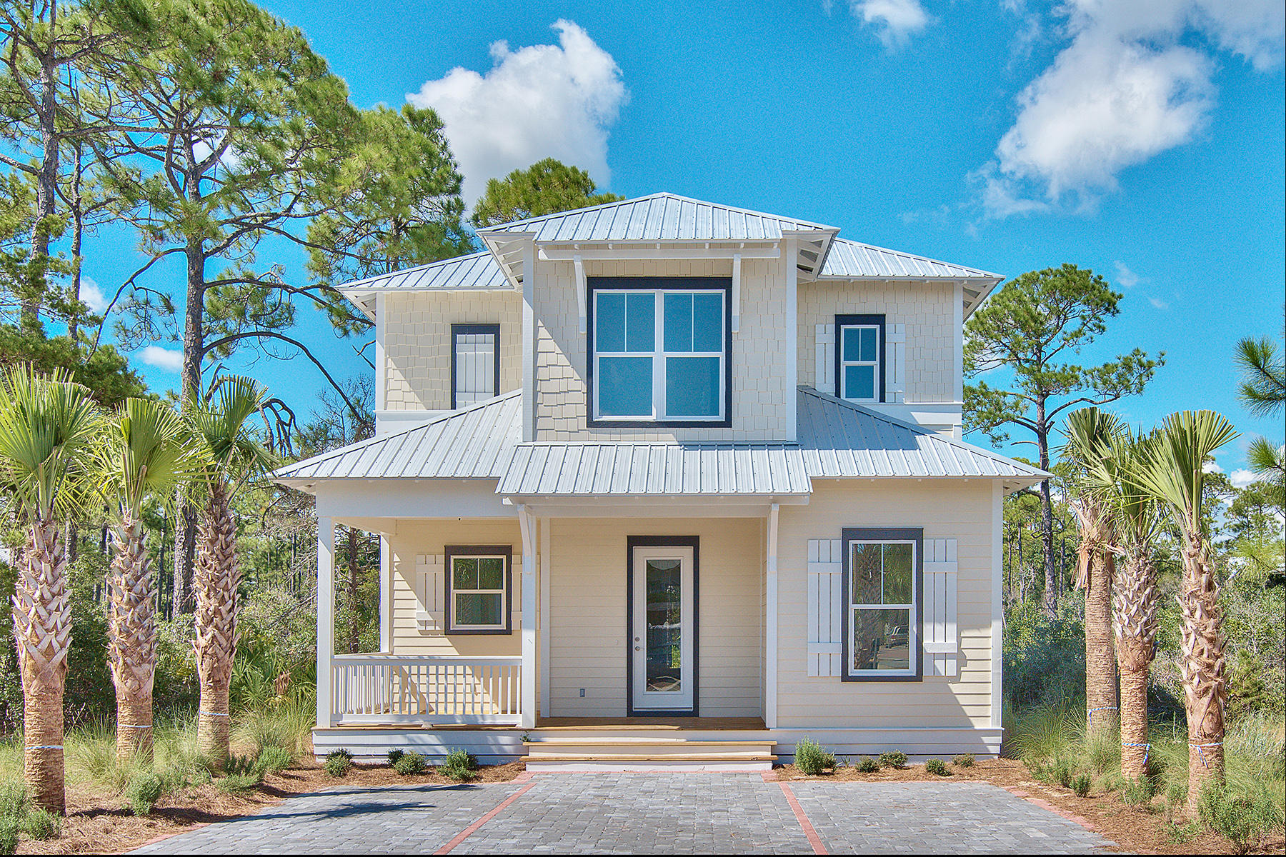 Generous Price Reduction! This custom built Seacrest Beach home backs up to tranquil open, protected space in this relaxed beach community. This luxurious home boasts a spacious great open floor plan, kitchen bar and dining area and light open family room. Kitchen is equipped with gourmet, modern, stainless steel appliances, including a gas range. Soft close cabinets throughout home, open kitchen to family room to include family and friends gathering together. Spaciously appointed bedrooms have private on suite bathrooms and of course, custom tile appoints each bath. The master bedroom suite has a large walk in closet, separate tub and show with a European shower door, and private deck to enjoy the tranquilty of the open space. Best perk : owners own their own beach!