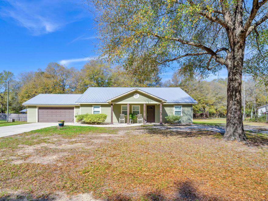 Sitting on 1 acre, this 2017 custom-built home offers fantastic outdoor living with a 500+ sq. ft. covered porch, paver patio with pergola, and a professionally installed pole barn on a concrete slab for RV/boat storage. Inside, the master suite features a walk-in closet and a dedicated vanity space, with custom-tiled showers in both bathrooms. The kitchen boasts a 6-foot island with ample storage, and flooring is tile throughout with carpet in bedrooms. Additional features include a tankless water heater, manifold system, partially floored attic, Hardie Board siding with joint flashing, termite bond, and no HOA. Meticulously maintained--don't miss this one! *outside fridge does not convey. 

5346 Fox Hound Ln, Baker Fl 32531
Located just minutes from town, this custom-built 2017 home sits on one acre and has been meticulously maintained by its original owner. Designed for both comfort and functionality, this home offers thoughtful details throughout. Step inside to find an accessible master suite featuring a walk-in closet and a designated vanity space in the bathroom. The custom-tiled showers in both the master and hall bathrooms add a touch of elegance. The open kitchen boasts a 6-foot island with ample cabinets and drawers, providing plenty of storage and workspace. Flooring includes tile throughout, with carpet in the bedrooms for added warmth. The home is equipped with a tankless hot water heater, a manifold water system, and a partially floored attic for extra storage. The exterior is just as impressive. The garage's back door opens to a paver patio and pergola for backyard grilling, while the back door leads to over 500 square feet of covered porch with three ceiling fans, perfect for outdoor relaxation. A 35 foot pole barn on a concrete slab provides additional storage options. The Hardie Board siding with joint flashing ensures durability, and a termite bond adds peace of mind. For those who love a touch of nature, grape vines enhance the outdoor space. With no HOA, this property offers flexibility and privacy. Don't miss the chance to own this well cared for home with unique custom features. Schedule your showing today!