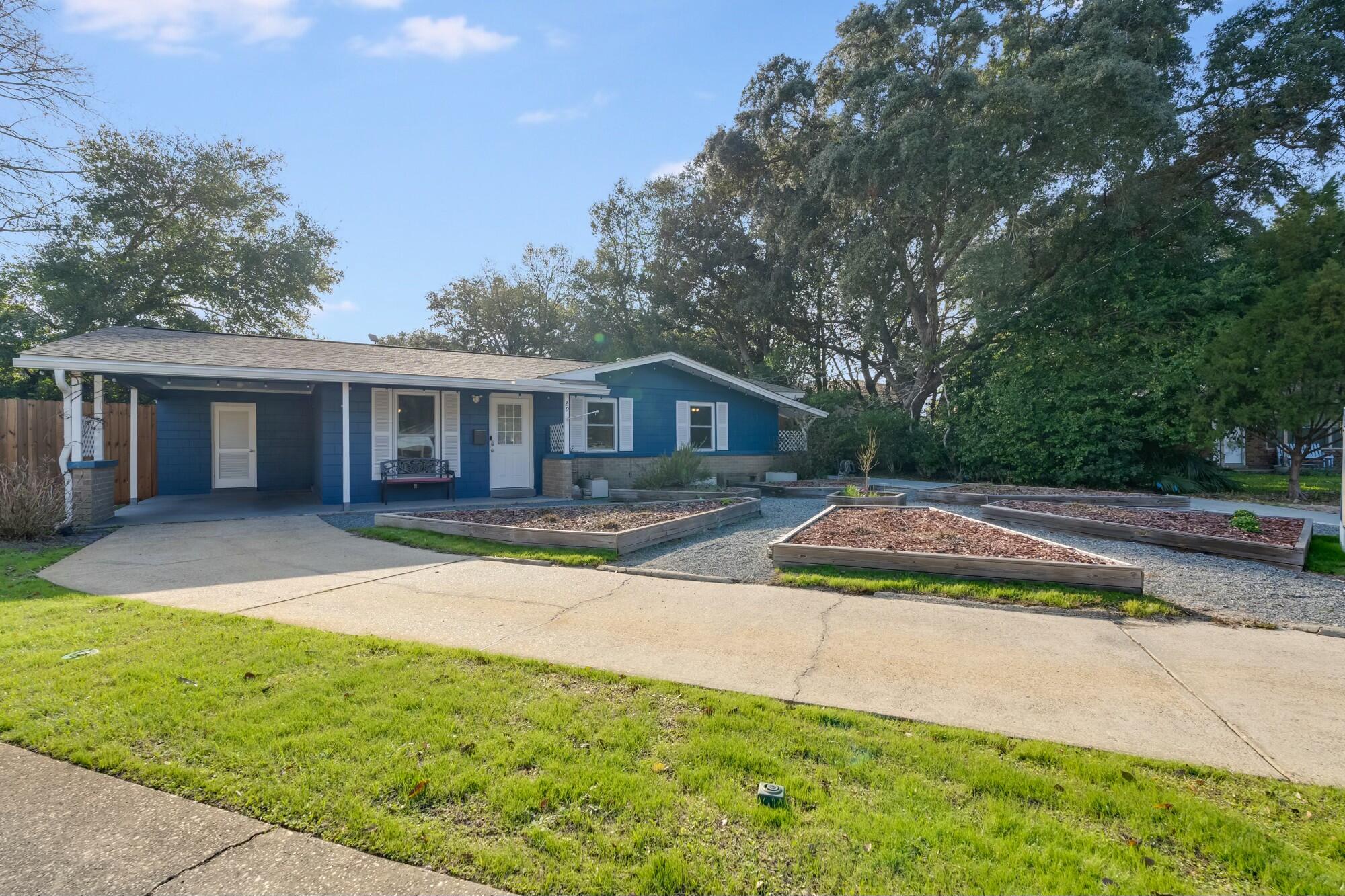 Welcome to the newly upgraded 29 Caswell Circle - the perfect blend of comfort, charm, and space! Situated on the largest lot in the neighborhood, this home offers the tranquility of a quiet cul-de-sac and the beauty of custom-built raised garden beds in the front yard. Step into the expansive, fully fenced backyard, complete with a screened-in porch and a bonus work shed - ideal for all your outdoor projects and relaxation. Inside, you'll find stunning wood and tile floors throughout, creating a warm and inviting atmosphere. The open floor plan is designed for easy entertaining, with seamless access to the kitchen and dining area from both the carport side entry and the front door. Plus, the spacious living room features sliding glass doors that open to the screened porch - perfect for enjoying the outdoors year-round.
This home is ready to impress, offering a combination of convenience, privacy, and style. Don't miss your chance to make it yours!