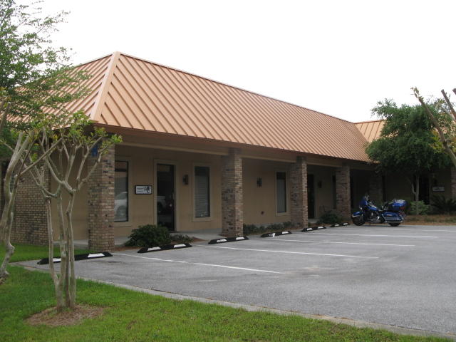 7 offices, conference room, break area, 4 Restrooms, 2 entrance doors.