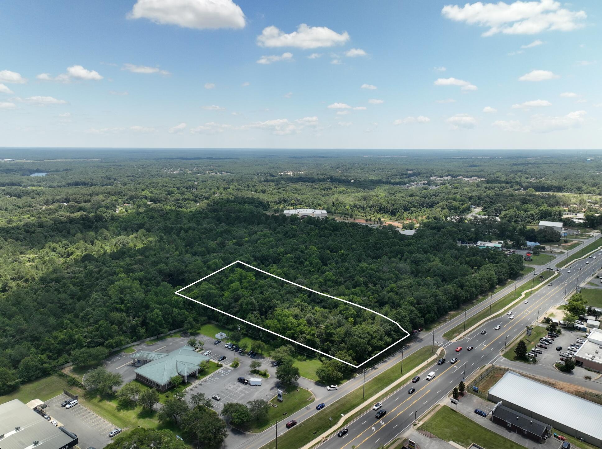 2.2 acre out parcel located on Highway 85N/Industrial Drive. It is located inside the city limits of Crestview. The average daily traffic is 29,000 cars a day, these numbers are from a report done by the State Of Florida Department Of Transportation. This Parcel is adjacent to a new Neighborhood Walmart that is about to start construction in the upcoming year. This property is less than 1 mile from Crestview High School. Also, this property is close in proximity to several residential neighborhoods, national retailers, and restaurants, including Publix, Whataburger, Firehouse Subs, Popeye's, Chick-Fil-A, Taco Bell, Starbucks, Dunkin' Donuts, Panera Bread, Arby's, McDonald's, and Jimmy John's