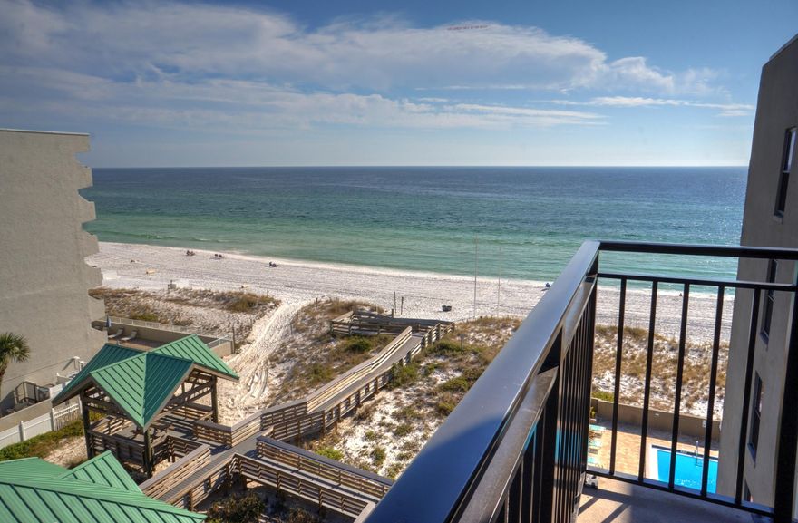 This Penthouse, four bedroom, completely remodeled Condo in Emerald Isle is a rare find! The views of the Gulf and also the Intercoastal from *both* balconies are breathtaking! Newly installed LVP flooring is featured throughout the entire unit. Granite and cabinetry upgrades are in the kitchen, bath and vanity areas, and the tubs have tiled walls. The kitchen appliances are all stainless. All popcorn has been removed and crown molding put up in the living/dining areas. Crisp white trim combined with a beautiful coastal blue wall color emphasize the beachy feel of this Condo. Both of the HVAC units were replaced in 2019. The water heater was replaced in 2021. An assigned, covered parking space conveys with this unit, only 15 of which exist! An inside storage cage is located