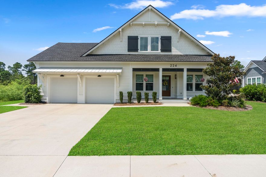 Positioned on the largest homesite within its community, 224 Needle Cast Lane offers 4,066 square feet of carefully considered design, where architectural detail and modern comforts unite. This custom-built residence features five bedrooms, five and a half bathrooms, and a layout that balances open-concept living with spaces crafted for both privacy and connection.The kitchen is a statement in itself, anchored by a dramatic marble waterfall-edge island and complemented by luxury appliances and bespoke cabinetry. Hardwood floors run throughout, adding warmth and refinement, while two thoughtfully placed wet bars--one upstairs, one downstairs--underscore the home's capacity for entertaining. The primary suite presents a custom-designed closet and serene retreat, while the fifth bedroom upstairs offers flexibility as a game room or media room, complete with its own wet bar. Beyond the interiors, a large enclosed back patio with built-in grill flows seamlessly to the heated saltwater pool, enhanced by upgraded pavers and a fenced backyard that extends the sense of retreat.

Additional appointments include a whole-home generator, whole-home surge protector, air conditioned garage, expansive storage, and the distinction of a cul-de-sac setting, further elevating the sense of privacy.

Defined by its scale, detail, and livability, this home embodies a lifestyle of elegance and ease in Inlet Beach.