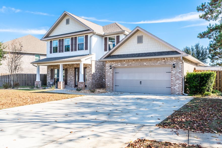 There's no place like (your new) home for the holidays! Brand new carpet, fresh paint throughout! Move in ready!!Welcome to 279 Windchime Way--where space, style, and serenity meet in the heart of Hammock Bay. This beautifully maintained 4-bedroom, 3.5-bath home offers over 3,100 square feet of living space across two stories, with thoughtful upgrades (see list in docs) and a peaceful pond view out back.Step inside to find two spacious living areas, a gas fireplace, trey ceilings, and a kitchen built for entertaining--complete with a large island. The primary suite is located on the first floor and features a sitting area, walk-in closet, and a luxurious bath with double vanities, garden tub, and separate shower. Upstairs, you'll find three generously sized bedrooms and two full baths, perfect for guests or growing households. One bedroom has its own en-suite full bath-perfect for guests or multigenerational living.  Outside, enjoy a screened-in porch overlooking the pond, an open patio, and a sprinkler system, all on a 56-foot waterfront lot.

Located in the Whispers subdivision of Hammock Bay, this home includes access to resort-style amenities: pools, clubhouse, fitness center, bike trails, nature trails, dog park, general store, Props, and more. Plus, you're just minutes from the beaches of South Walton and the conveniences of Freeport. Buyer to verify all measurements and dimensions. 