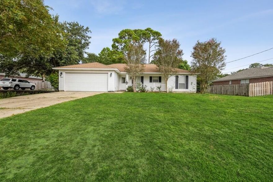 Beautiful home in Holley By the Sea with quick access to HWY 98 and near stop lights for easy access. Over 1/2 acre of land which is cleared and ready for outdoor entertainment.  The wood floors gives the common area a warm feel that extends into an updated kitchen. Stainless steel appliances throughout kitchen w/granite countertops Accompanied with a stylish ventilation hood, backsplash that enhances and modernizes this area for the perfect ambiance.  The split floor plan parks the master bedroom west of the floor plan and is built for peace and privacy.  This affordable oasis is ready to move in with tons of extras/upgrades.  You don't want to miss this amazing deal and community amenities which include club house, sound side access and waterfront activities. Your dream home awaits!!!!