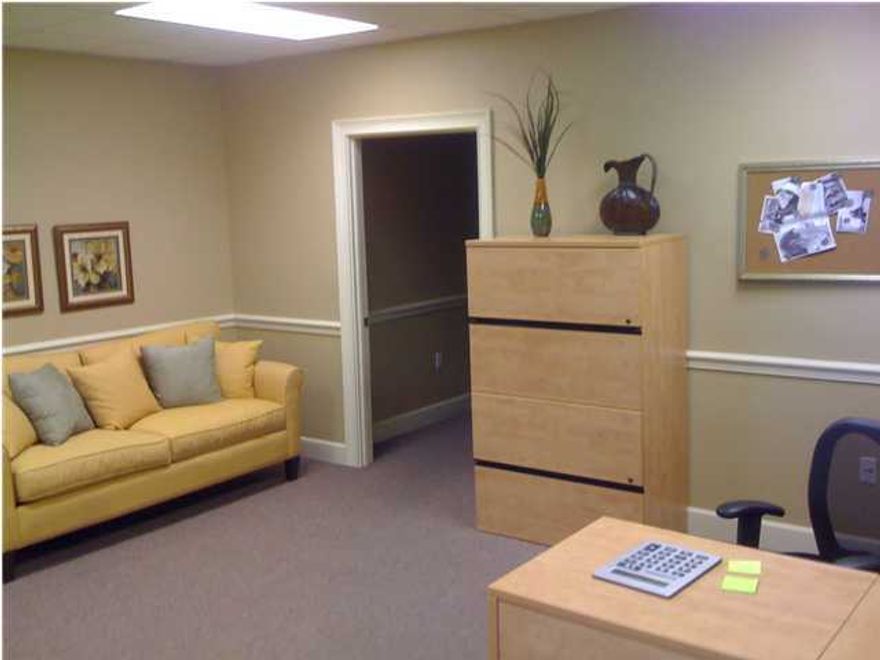 2nd Floor, Ste. E. This 2500 sf office space has been divided into executive suites. We have 7 offices for lease ranging in price from $450/month to $800/month. As you enter the office you are greeted with a comfortable reception area, professional conference room which are both common to all tenant's and guests. We also have two larger suites that have a private bathroom, Ste. 1 & 3. In addition, there is a common kitchen area equipped with built in cabinets, refrigerator, & coffee maker. These will be leased as Gross Leases in that you will only pay your flat rate plus 6% sales tax. The lease includes all utilities including Electricity, Water & Sewer. Each tenant will pay for its phone & internet.