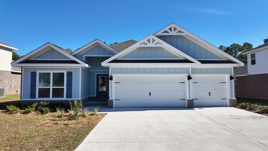 STUNNING NEW CONSTRUCTION in ROMAN OAKS COMMUNITY! The Destin floor plan is a fabulous 4 bedroom, 3 bath home with a covered patio & a roomy 3 CAR GARAGE. Large breakfast nook & separate dining area. Very comfortable open design for easy entertaining. Stunning quartz counter tops in the kitchen & baths, stainless steel appliances, breakfast island bar & a corner pantry. Spacious bedroom 1 with a walk-in closet, double vanity, garden tub & a large separate shower. Beautiful wood look engineered vinyl plank flooring throughout with carpet in the bedrooms. This home comes standard with a Smart Home Technology package which includes a KwikSet keyless entry, Skybell doorbell, automated front porch lighting, an Echo Dot device and a Quolsys touch panel. Hurricane window protection is included. ALL LISTING pictures, colors, features, and size may vary. Square footages are approximate.