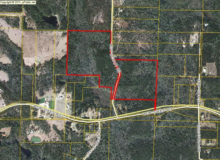 32.33 Acres of wooded beauty and creeks.