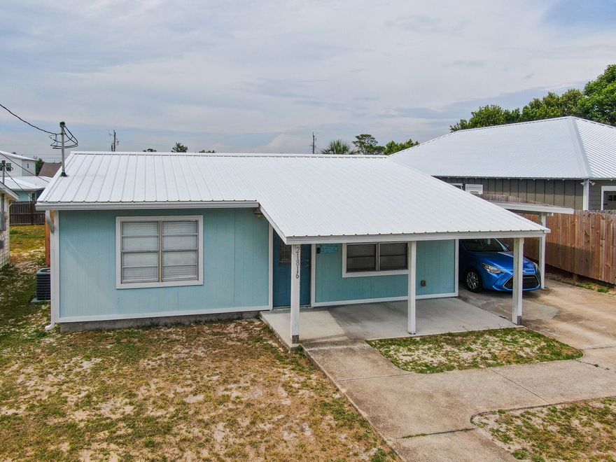 Just blocks away from the serene Panama City Beach, this charming beach cottage presents a prime investment opportunity. With short-term vacation rentals permitted, it's perfect for those seeking to capitalize on Florida's thriving tourism industry. Boasting a durable metal roof installed in 2016, this home also provides space in the backyard for potential pool installation, further enhancing its appeal. Inside, discover a modern kitchen, an updated bathroom, and durable vinyl plank flooring that adds a touch of warmth. The HVAC system, replaced in 2015, and ceiling fans throughout ensure a comfortable climate all year round. Please note, room dimensions are approximate and require verification by the buyer. This well-maintained property offers an excellent
