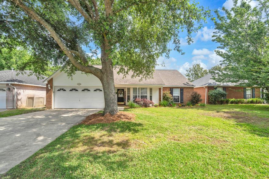Utopian location! Attractive assumable 4.375% VA loan! Even more, $80,000 in upgrades has refined this hidden gem, a Bluewater Bay classic adjacent to the highly-acclaimed Bluewater Bay Elementary school within the gated community of Parkwood Estates. This 4 bed / 3 FULL bath two-story home has all the comforts your family could desire. Nothing has gone untouched with brand new LVP floors, a redone fireplace and mantle, complete restructure of the kitchen and its cabinets, new paint, new vanities, new toilets...you name it! The first floor has a large family room and formal dining with 2 bedrooms downstairs. The newly carpeted second floor shares a loft with 2 bedrooms either side. The back porch enjoys a fenced backyard with plenty or room for the kids as well as a Tool Shed. Irrigation pump and well replaced 2024. HVAC installed 2022 with 10 year warranty. There's a massive playground across the street to accompany the miles of sidewalk and forested mountain bike trails behind the community. Residents have access to any of the 3 community pools, pickle ball courts, and golf course. A short drive down range road has you accessing the Mid-Bay bridge in minutes exposing your family to the world's finest white sandy beaches of Destin. Come see!