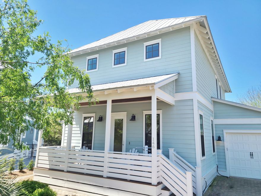 Located only two blocks to the beach, this neighborhood on Big Redfish Lake, is nestled between the State Forest with hiking and biking trails, and Redfish Village which offers shops, dining and much more. Easy to get to so many places in Blue Mountain Beach from this beach cottage. Inside, the 21 foot architectural beam ceiling invites you into the open floor plan with living and dining in front, and spacious kitchen just beyond. SS Kitchen Aid appliance including ice machine. The master suite, laundry room and half bath are also on first floor. Variable-width solid oak flooring is throughout this home, with travertine flooring in bathrooms. 10 ft ceilings with crown molding and 8ft solid-core doors throughout the home.