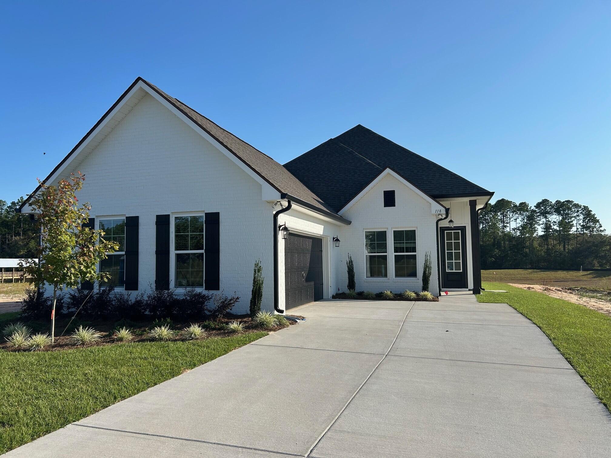The AUBRY III G in Natureview community offers a 4 bedroom, 2 full bathroom, open design. Upgrades added (list attached). Special Features: double vanity, garden tub, separate custom tiled shower, and walk-in closet in master bath, tray ceiling in master bed, walk-in pantry, covered rear patio, undermount sinks, LED lighting, crown molding, ceiling fans in living and master, framed mirrors in all baths, smart connect WIFI thermostat, smoke and carbon monoxide detectors, landscaping, architectural 30-year shingles, flood lights, and more!Energy Efficient Features: water heater, electric kitchen appliance package, vinyl low E windows, and more! Energy Star Partner.