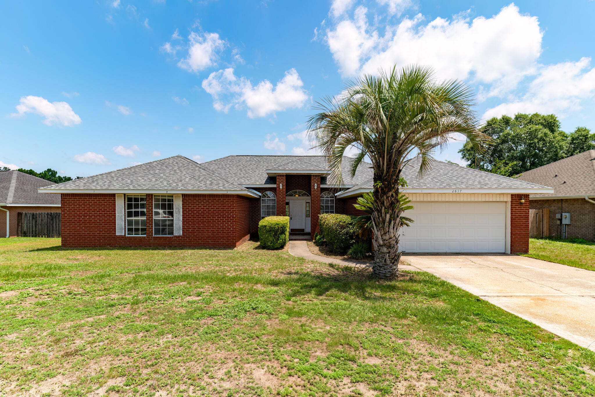 NEW ROOF.. NEW FLOORS.. NEW PAINT and this SPRAWLING BRICK RANCH is the LOWEST PRICED IN CHEROKEE BEND!!!Welcome to 2837 Tamiami Trail! This long-term highly lucrative rental boasts an oversized 4 BR/2 Bath **PLUS FLEX ROOM**floorplan that blends spacious design with functional living.Step inside to tiled entry, elevated ceilings, neutral paint and large picture windows that flood the home with natural light. The Living room is oversized with vaulted ceiling, BRAND NEW FLOORING, large windows and designer paint and FRENCH DOORS THAT LEAD TO A BACKYARD OASIS! Details on the backyard a little later.The cook's kitchen offers white shaker-style cabinetry with ebony solid surface counters, an expansive kitchen island that the family chef will enjoy.