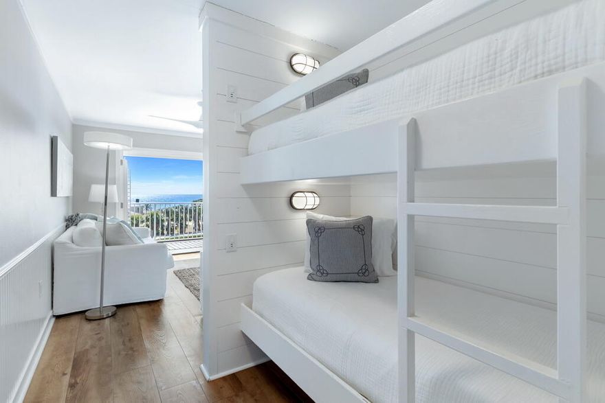 Gulf Place Caribbean unit 414 defines affordable luxury with million dollar finishes and amenities at a sub-million dollar price tag. The views are superb due to this unit being located on the top floor, and it also faces West which makes for immaculate sunsets in the Summer. The amenities (gated beach access, tennis, pickleball, & heated pool) are excellent, and the renovations in this unit are top tier. The location in Gulf Place is also a huge benefit because there's some of the best shopping and dining on 30A within walking distance. Some of my favorites are Shunk Gulleys (best tuna dip in town), Kith + Kin Coffee, Pizza By The Sea (great gluten free options), Perfect Pig, & Renaissance French Restaurant. An underrated benefit of this location is also being directly next to County Highway 393 which makes it easy to avoid traffic along 30A in the busy season.

Unit 414 is outfitted with white oak engineered hardwood flooring, shiplap accents, built-in bunk beds, and a beautifully renovated kitchen. Both bathrooms have also been renovated to include updated fixtures, flooring, and quartz countertops. This unit also has top-tier appliances including a stackable Frigidaire washer and dryer and Energy-Star rated GE stainless steel kitchen appliances.

This property sleeps up to 8 people and offers stellar rental potential. Rental projections of up to $50,000 and rental actuals of $40,000 in 2025 (with owner usage) makes this one of the better cash-on-cash returns along 30A. 
