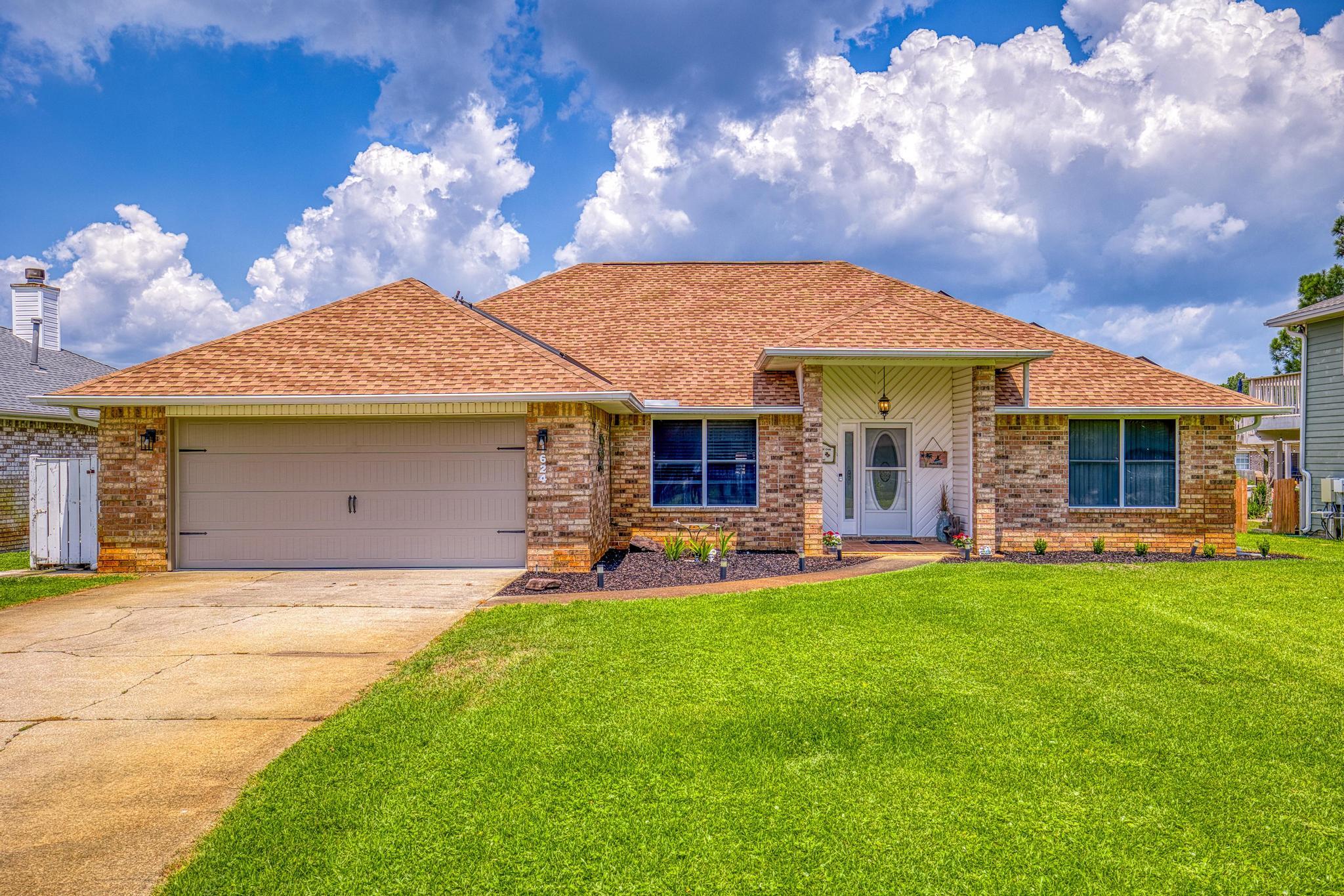 Welcome to this WATERFRONT home in Sought after Polynesian Islands. This one level home features a split bedroom floor plan and your dream backyard! Fish off your own private dock! The deep canal leads out to the Bay/gulf. Boat, Kayak, Paddleboard in your own backyard. Just 5 mi from pristine Pensacola Beaches, 10 mi from Pensacola, & 40 min from Destin. Above ground pool w/ salt water. The cozy spacious den features an electric fireplace. New carpet, Solar panels (pd off). Elec. bill on average is $30/month. Roof 2 years old. HVAC 6 years old. Irrigation system. Brand new seawall. There is a community boat ramp for neighborhood only. Top rated schools! Use as primary or short term rental. NO HOA unless you want to use boat ramp then it's just $35/yr. Boat & RV parking allowed.